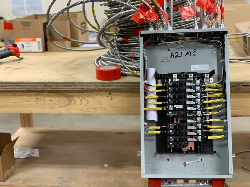 Residential electrical panel with breakers and new wiring