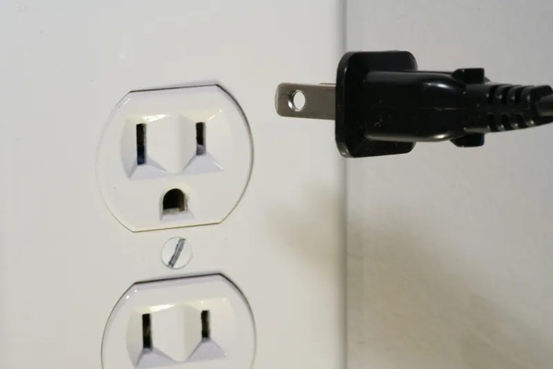 Plug next to a standard wall outlet