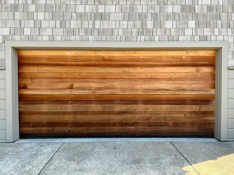 Horizontal wood-plank garage door