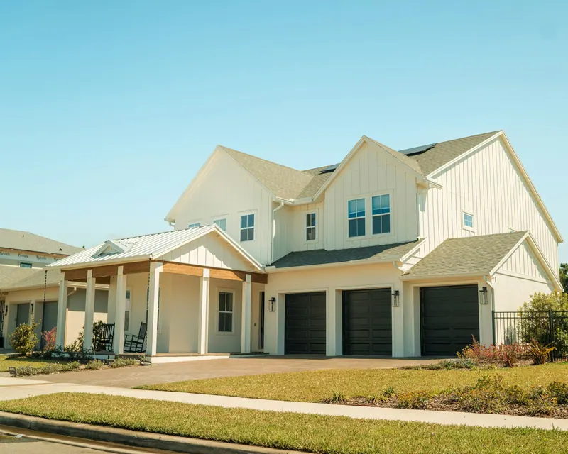 Newly built two-story house with a three-car garage