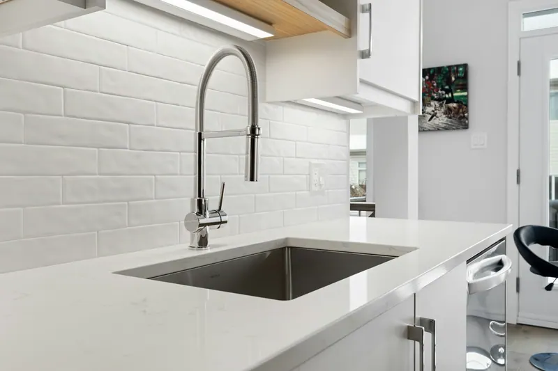Pull-down faucet over an undermount sink