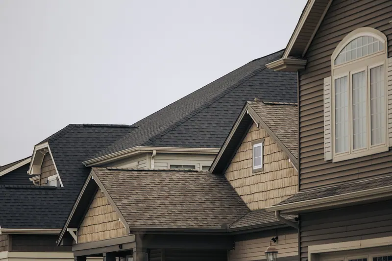 Shingled roofs and gables on a row of houses