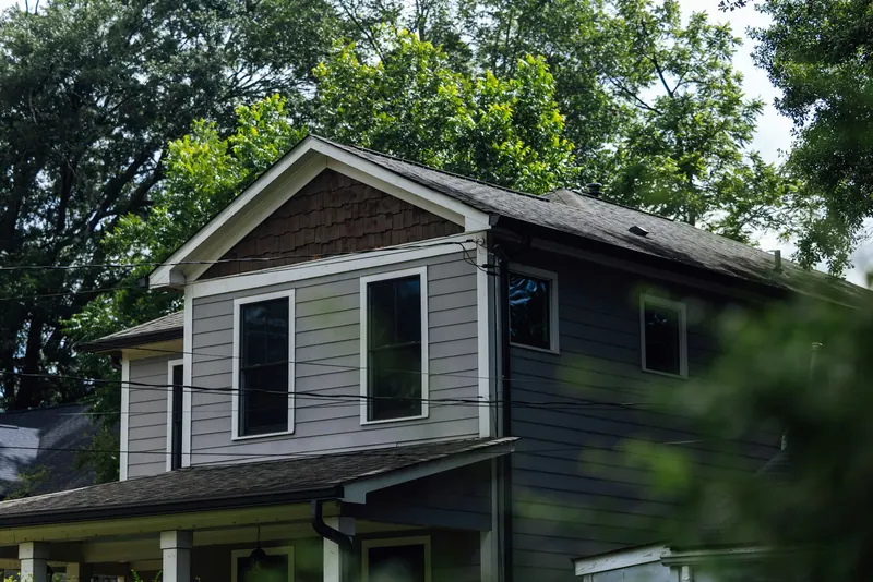 Two-story house with gray and dark siding